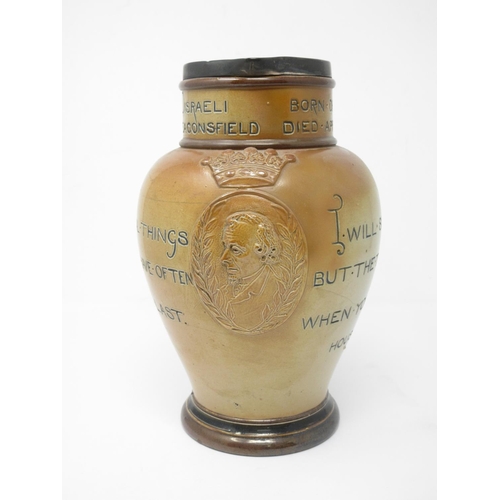 991 - A Doulton Lambeth stoneware Jug with medallion of Disraeli, Earl of Beaconsfield, silver rim, London... 