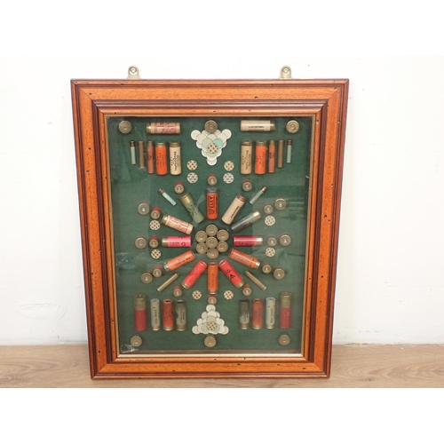 114 - A gun Cartridge Display in case, 2ft x 1ft 7in