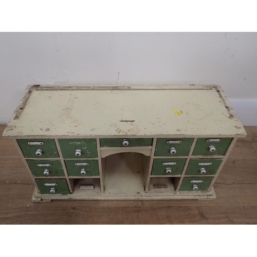 123 - A white and green painted Spice Cupboard, 1ft 11in W and a Coleman's Starch Box, 19in W