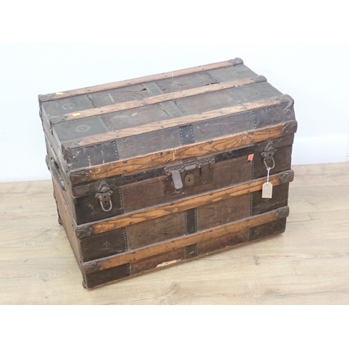 124 - A wooden and metal bound Sea Trunk with fitted interior, 2ft 8in W