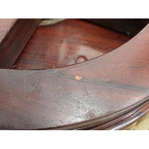 130 - A Victorian circular Piano Stool with rise and fall on turned supports and stretchers