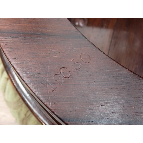 130 - A Victorian circular Piano Stool with rise and fall on turned supports and stretchers