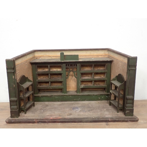 131 - A model of a Milliner's Shop, 2ft 3in W and a Doll's Stand