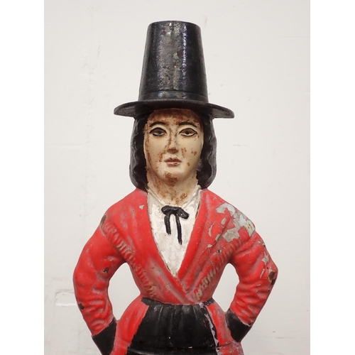 137 - A painted metal Figure of a Welsh Lady, 20in H