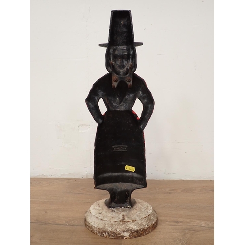 137 - A painted metal Figure of a Welsh Lady, 20in H