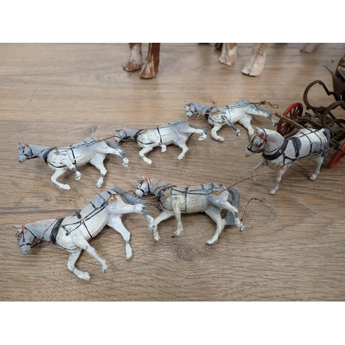 138 - A quantity of stuffed models of horses, horses and carriage, model fences etc