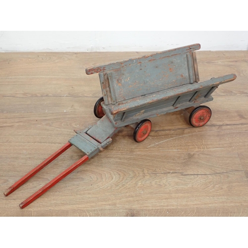 145 - Two models of wooden Carts and a painted wooden model of a Cot