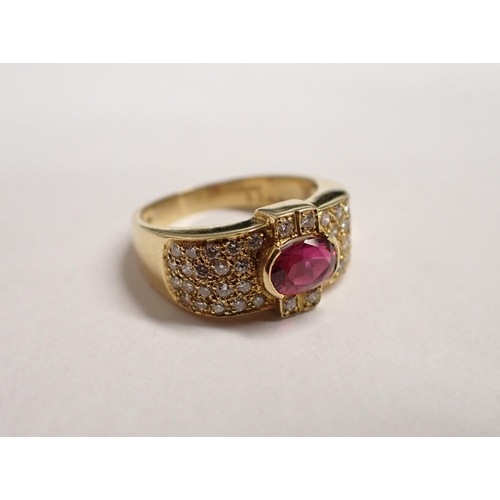 165 - A Ruby and Diamond Ring rubover-set oval-cut ruby, 0.86cts, within numerous brilliant-cut diamonds t... 