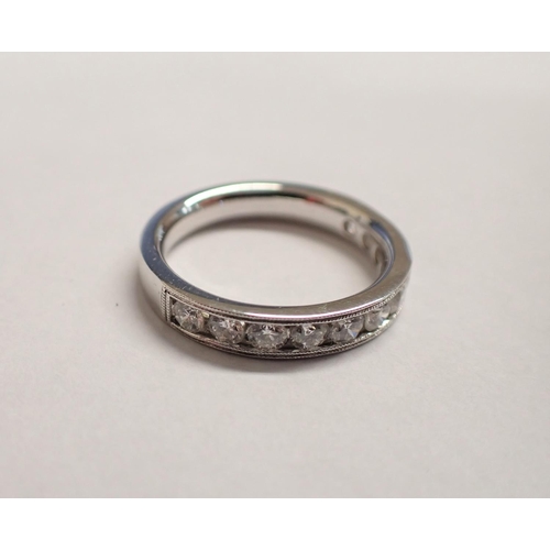 176 - A Diamond half Eternity Ring millegrain/channel-set brilliant-cut stones, total diamond weight 1.00c... 