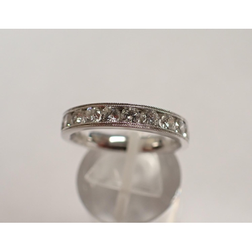 176 - A Diamond half Eternity Ring millegrain/channel-set brilliant-cut stones, total diamond weight 1.00c... 