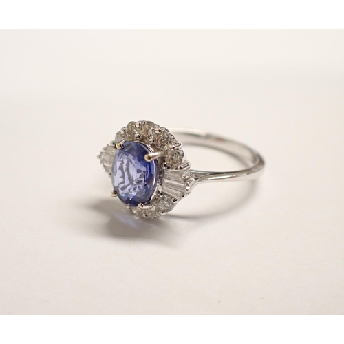 179 - A Sapphire and Diamond Cluster Ring claw-set oval-cut sapphire, 1.58cts, within a frame of baguette ... 