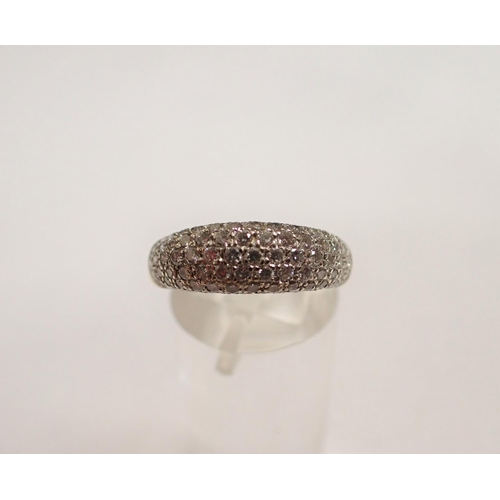 181 - A Diamond Bombe Ring pavé-set numerous brilliant-cut stones in 18ct white and yellow gold, ring size... 