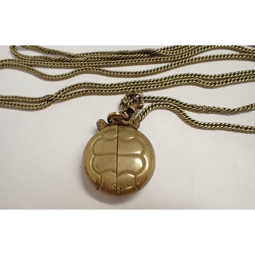 216 - An Estyma novelty Football Fob Watch on gilt metal Muff Chain