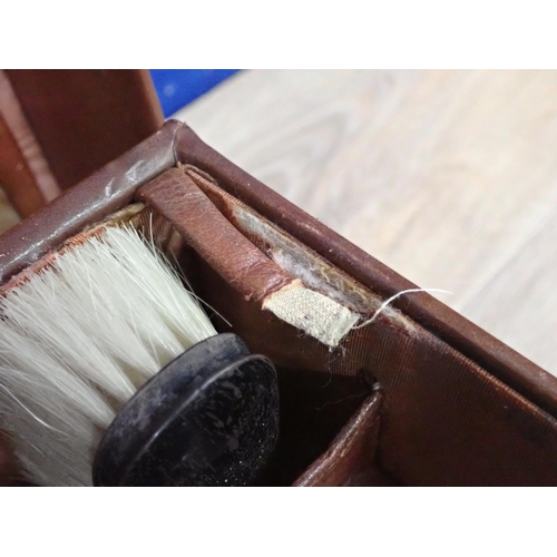 234 - A gentleman's leather Dressing Case with fitted interior and silver topped bottles in canvas outer c... 