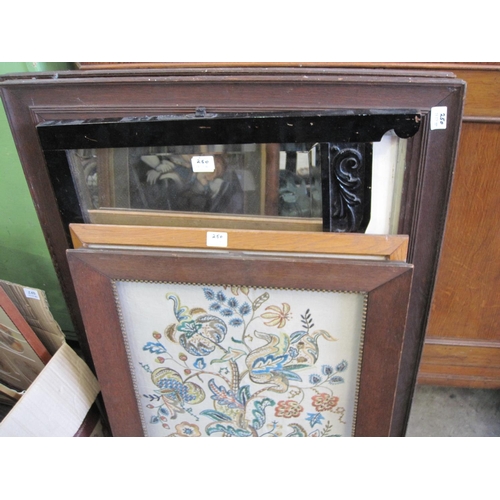 250 - A framed Embroidery depicting flowers; a Mirror and a miscellaneous selection of prints and reproduc... 