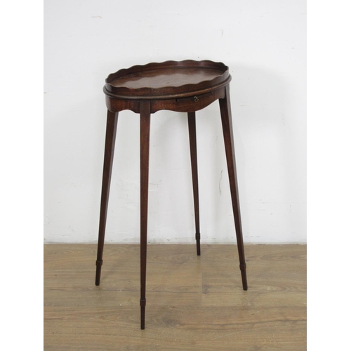 37 - A 19th Century mahogany oval Kettle Stand with pull-out slide on squared tapering supports