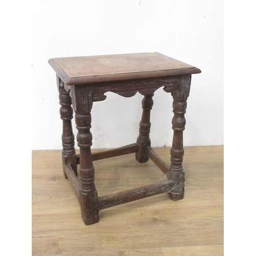 38 - An old oak Joint Stool in the 17th Century style with shaped frieze, turned supports and squared str... 