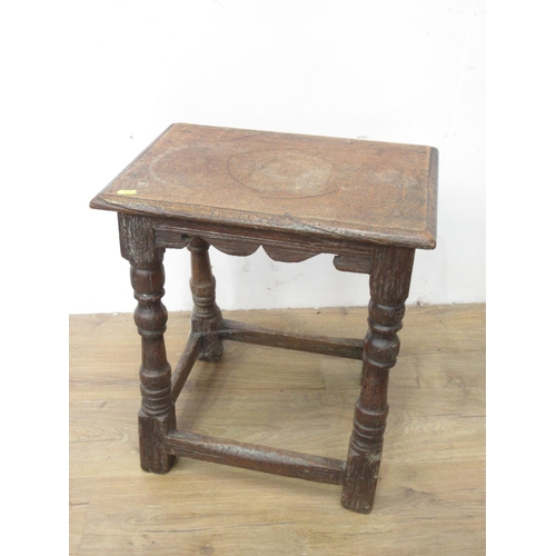 38 - An old oak Joint Stool in the 17th Century style with shaped frieze, turned supports and squared str... 