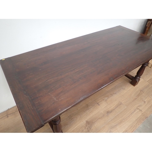 410 - An oak Refectory Table with baluster turned supports and H-stretcher, 6ft 7in x 2ft 11in