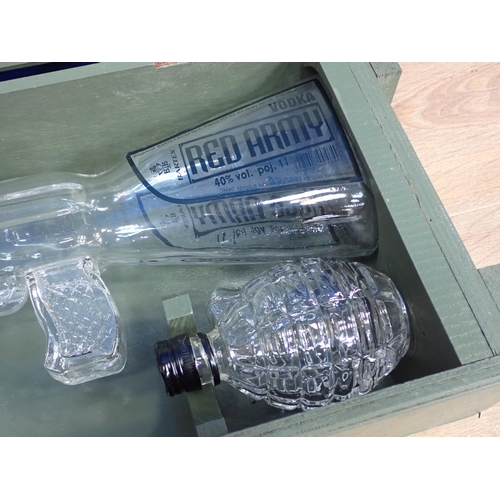 417 - A boxed 'Red Army' glass Vodka Kalashnikov and Glasses