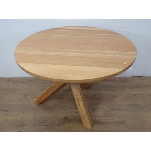 427 - A modern oak circular Dining Table on on cross base, 3ft 7in diam