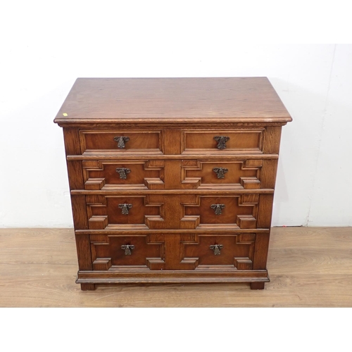 433 - A reproduction oak Chest of four long moulded drawers, 2ft 9in W, 2ft 8in H