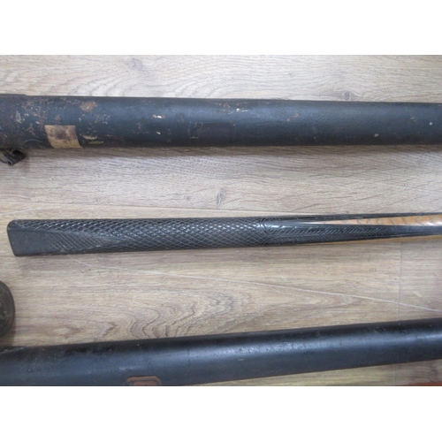 435 - Two old Snooker Cues in metal containers, one with carved ebonised handle