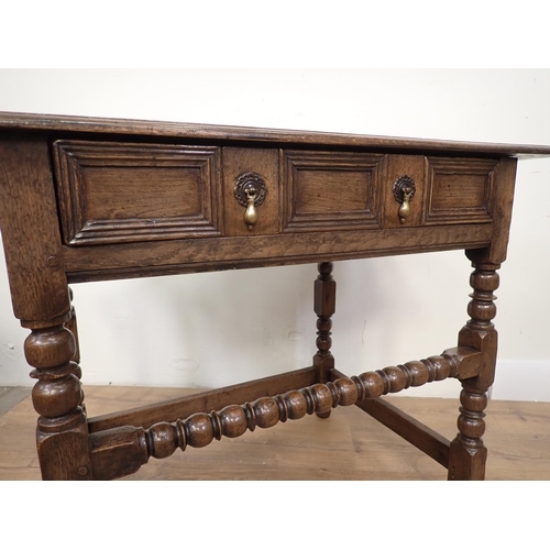 442A - An 18th Century oak Side Table with moulded single frieze drawer on bobbin turned supports and front... 