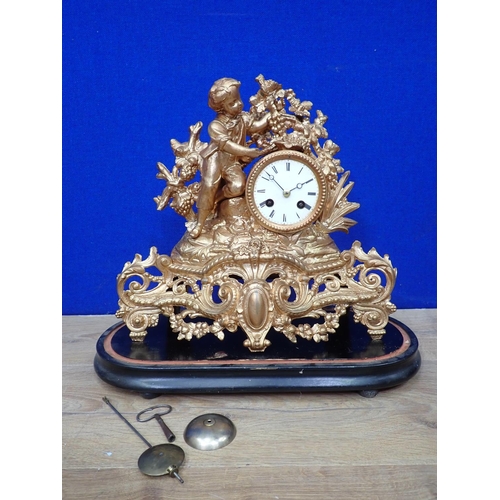 446 - A French style gilt metal Mantel Clock with figure of a boy beside the dial under glass dome, dome A... 