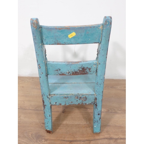 454 - A blue painted child's Elbow Chair, 20in H