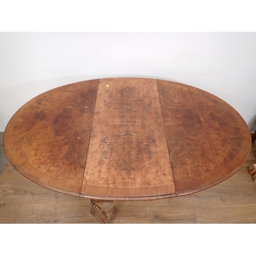 456 - A walnut dropleaf Dining Table with crossbanded oval top, raised on shell carved cabiole legs, 3ft W