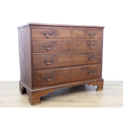 46 - A 19th Century oak Chest of four long graduated drawers on bracket supports, 3ft 5in W x 2ft 10in H