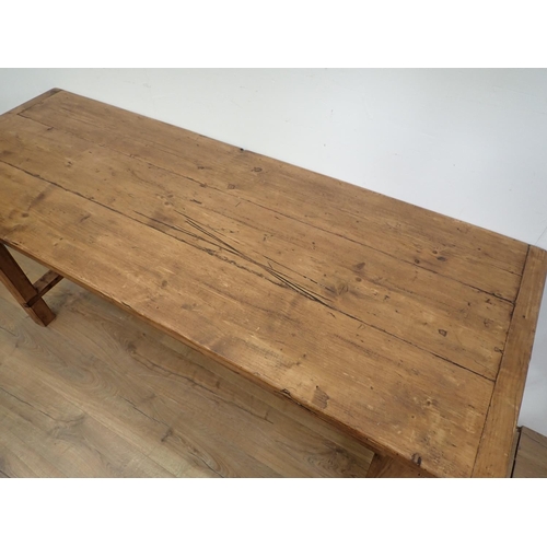 479 - A stained Pine Table with squared supports, 5ft 10in L x 2ft 2in W