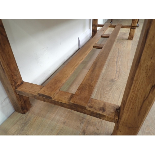 479 - A stained Pine Table with squared supports, 5ft 10in L x 2ft 2in W