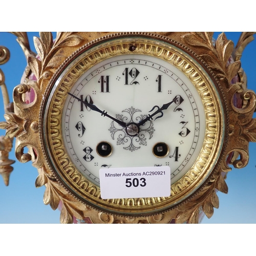 503 - A gilded metal Mantel Clock with porcelain panels of reclining cherub and floral wreath, chiming on ... 