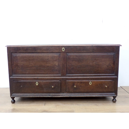 521 - An early 18th Century oak Mule Chest with hinged top, panelled front above a pair of drawers, 4ft 2i... 