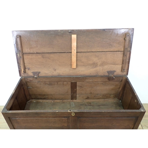 521 - An early 18th Century oak Mule Chest with hinged top, panelled front above a pair of drawers, 4ft 2i... 