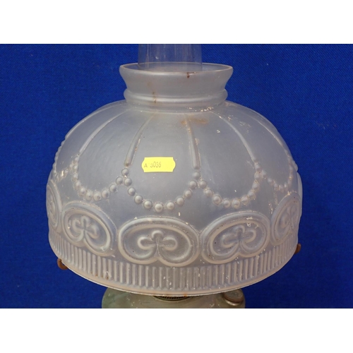 533 - A metal Paraffin Lamp with frosted glass moulded shade