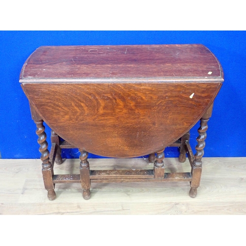 551 - An oak gateleg Table, a two tier Plant Stand, a Bedside Cupboard, an inlaid Edwardian Davenport Desk... 