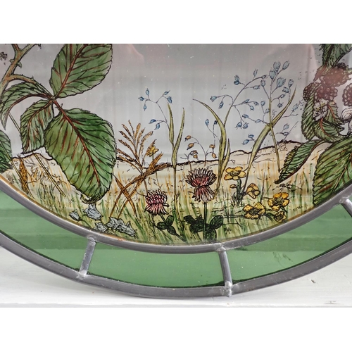 562 - A circular leaded Glass Panel depicting bird in flight, 15in Diameter