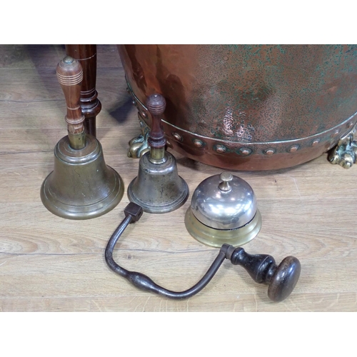 565 - An antique copper Log Cauldron with brass lion mask handles and paw feet, 19in Diameter, two Hand Be... 