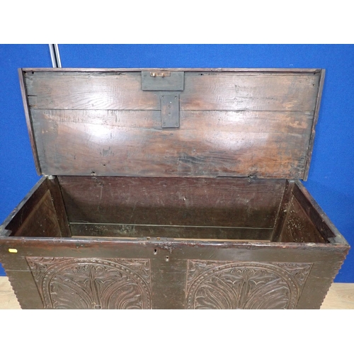 566 - A 17th Century oak Welsh boarded Coffer with carved front, 3ft 11in W