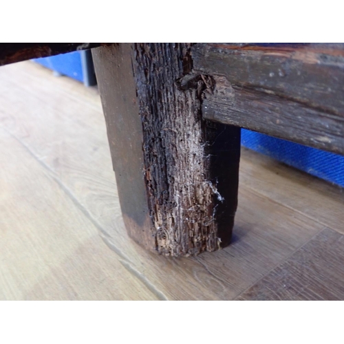 572 - An antique oak dropleaf Table with oval top on squared supports and stretchers, 3ft 7in W