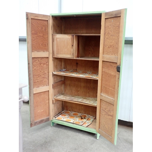 592 - A large green painted Cupboard with shelves to the interior, 6ft 6in H x 3ft W