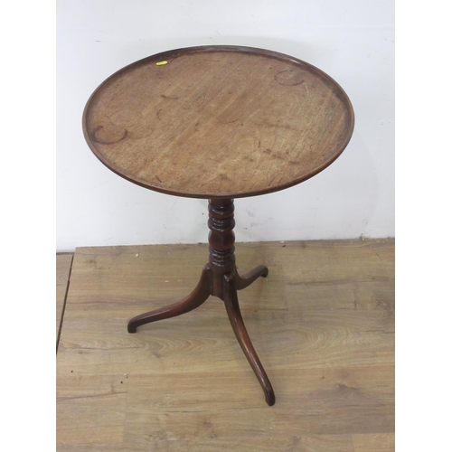 61 - A 19th Century mahogany tripod Table with single piece dished top on turned column, 1ft 10in diam A/... 