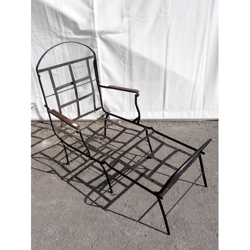 628 - A black painted folding Campaign Chair