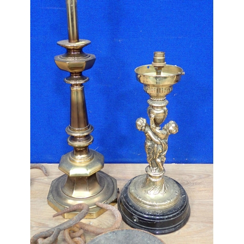 65 - Two copper Pans, wooden mounted Shields, three sets of Weighing Scales, a brass figural table Lamp a... 