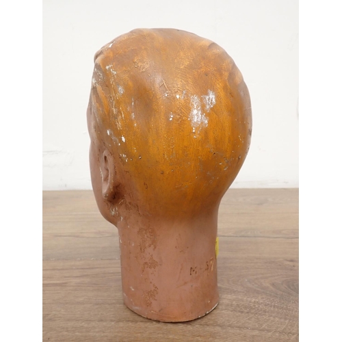 74 - Two plaster Heads and a papier mache Head, 13in to 8in