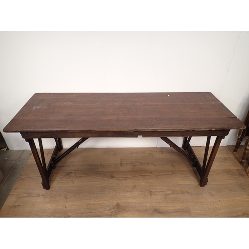 76 - A stained rustic Trestle Table, 6ft L