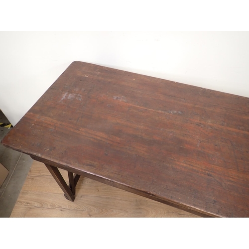 76 - A stained rustic Trestle Table, 6ft L